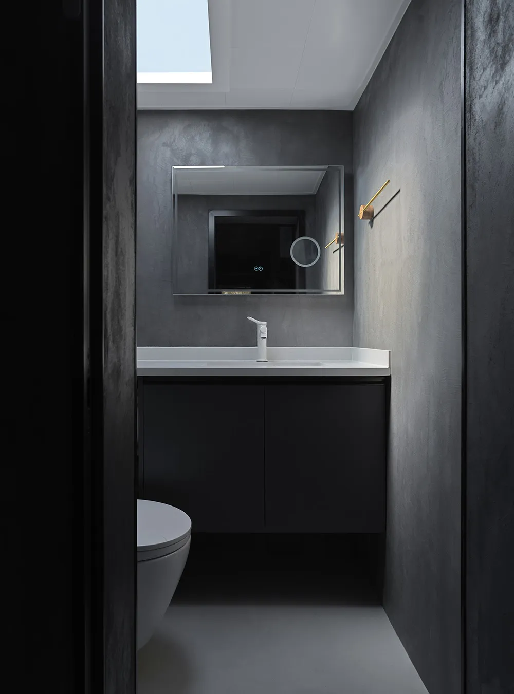 Modern bathroom with concrete walls and floor, minimalist design, and white fixtures.