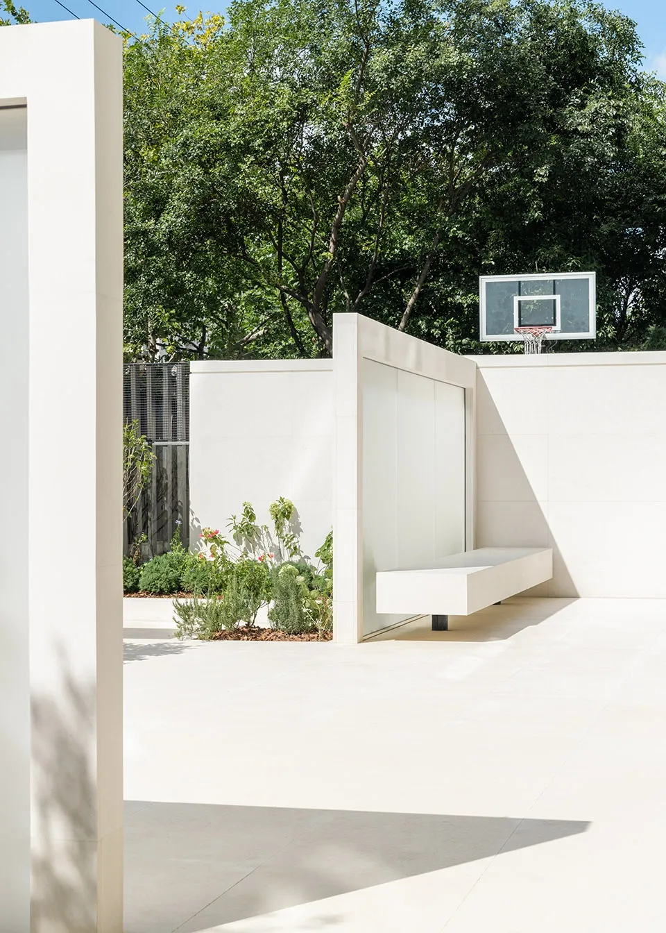 Modern swimming pool house featuring minimalist white concrete architecture