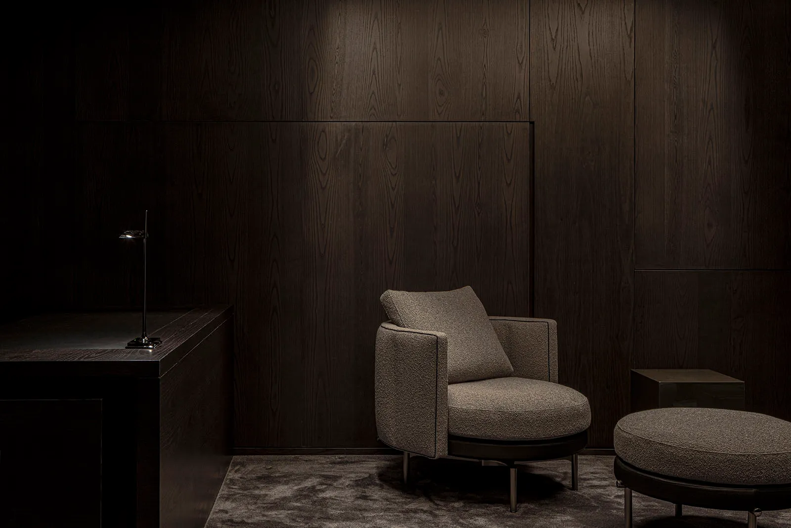 A modern minimalist interior designed with fabric and wood materials.