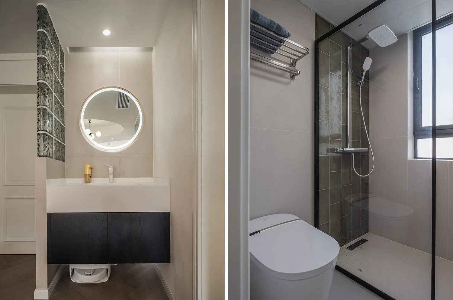 Modern minimalist bathroom with a sleek sink, large round mirror, and dark wooden vanity. The shower area features a glass en