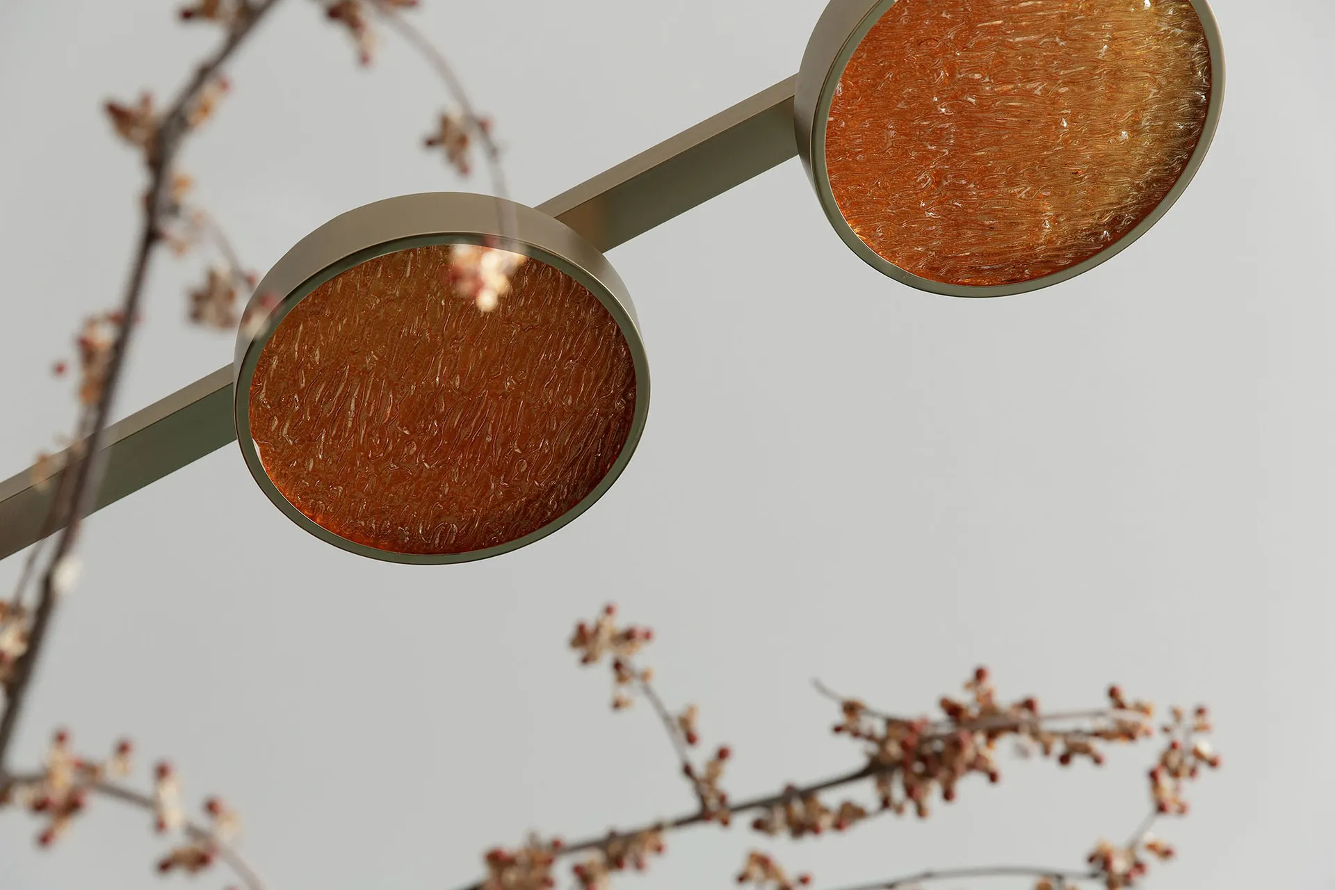 Minimalist design featuring metallic copper light fixtures