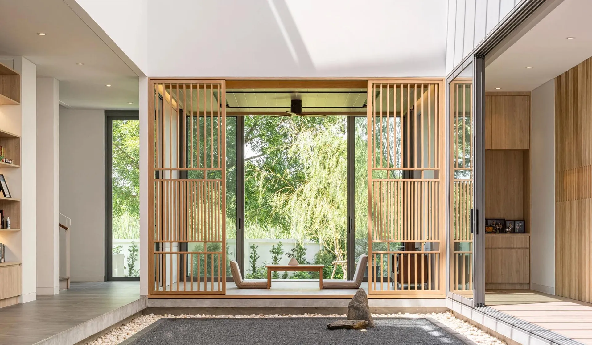 A modern living room featuring proper window placement for optimal natural light and views.