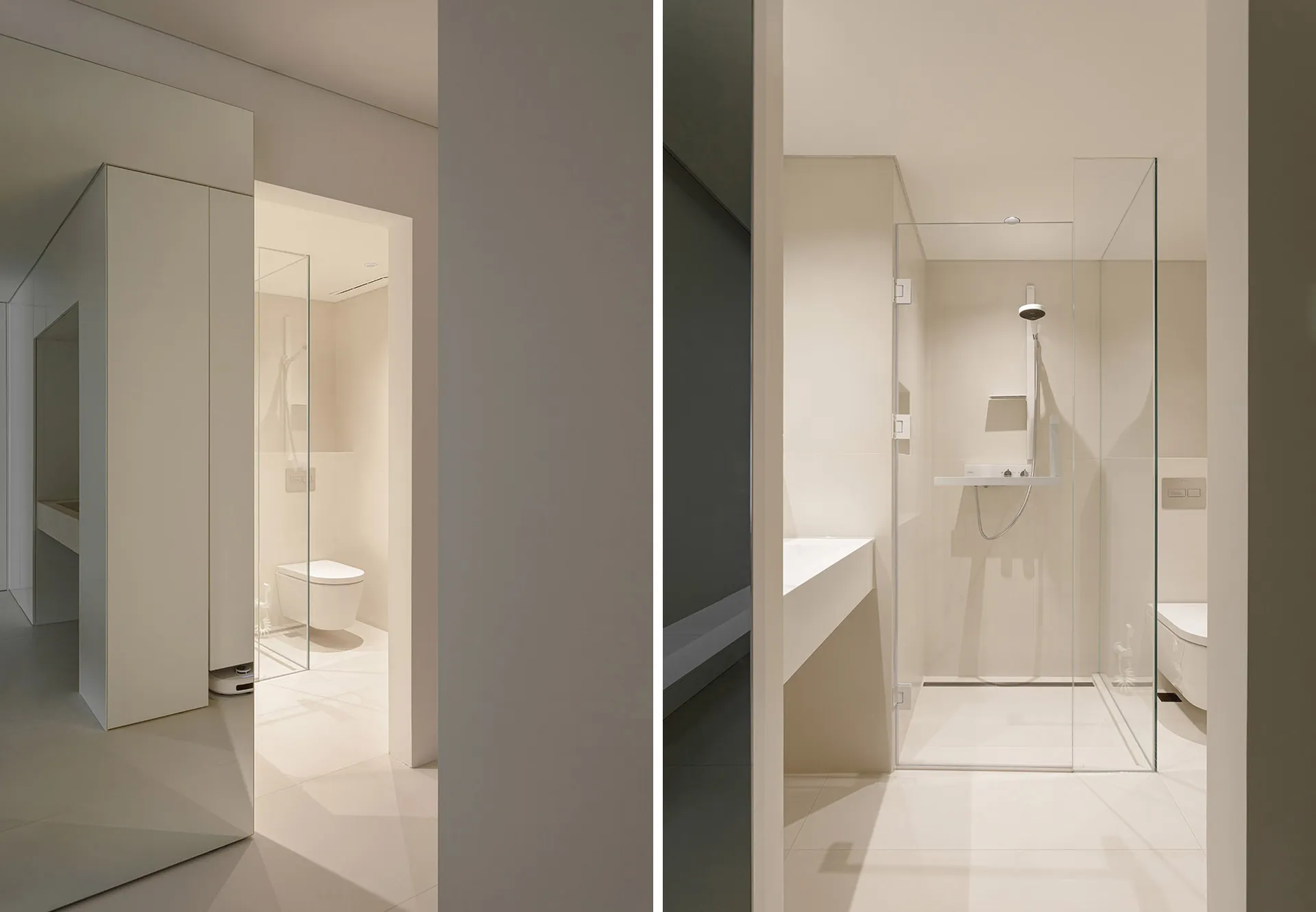 A modern bathroom featuring concrete, glass, and white materials.