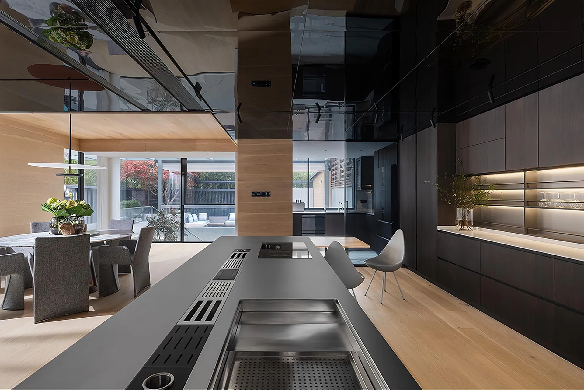 A modern residential kitchen featuring sleek, contemporary design elements and a minimalist aesthetic.