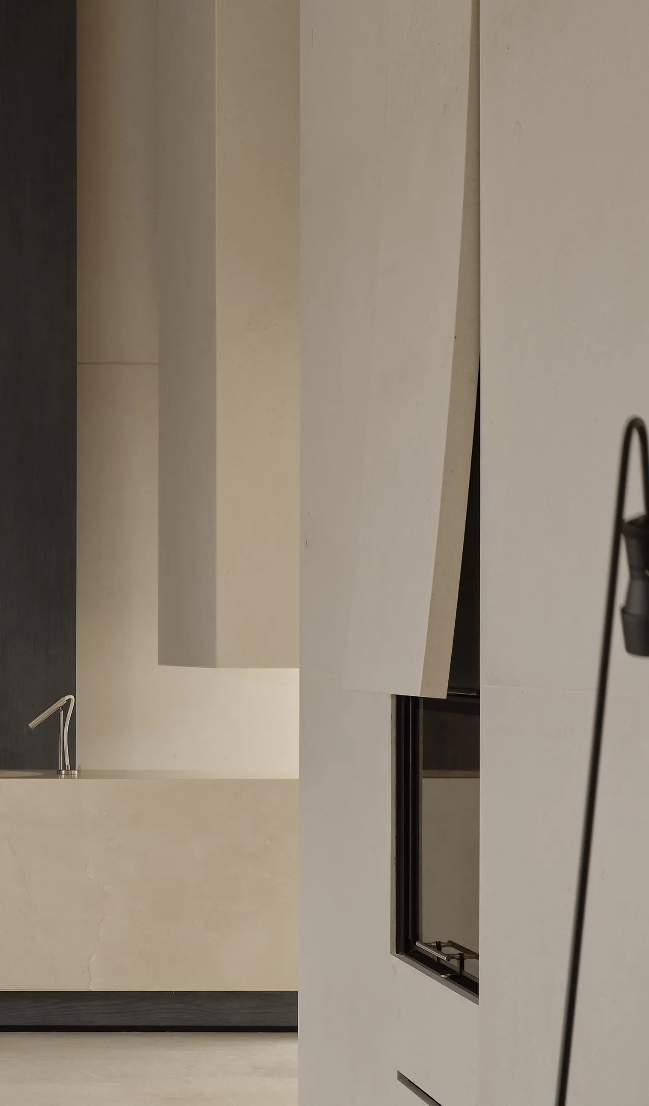 Modern minimalist architecture featuring concrete walls and minimalist design elements.