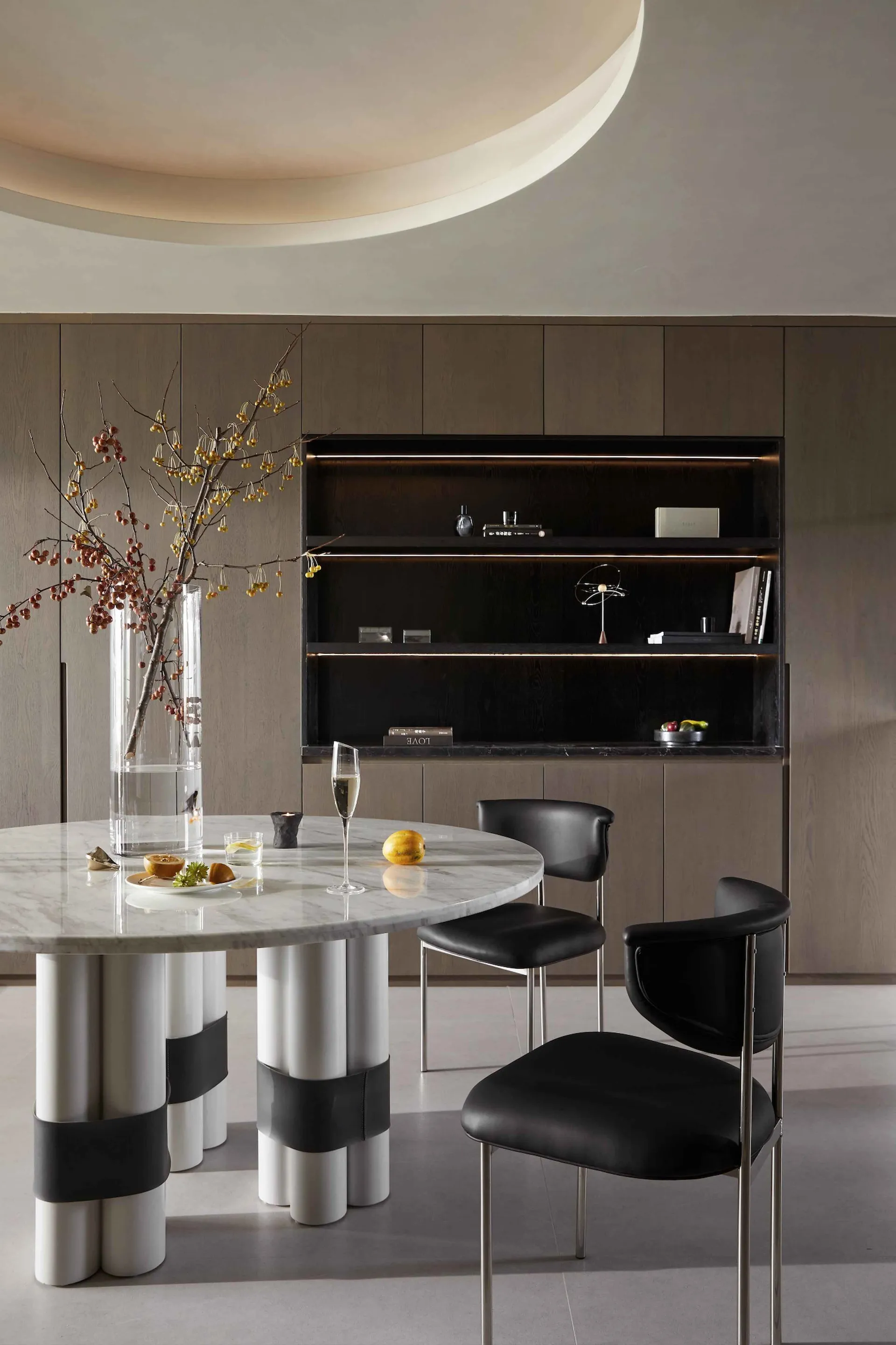Modern dining room with marble table and chairs