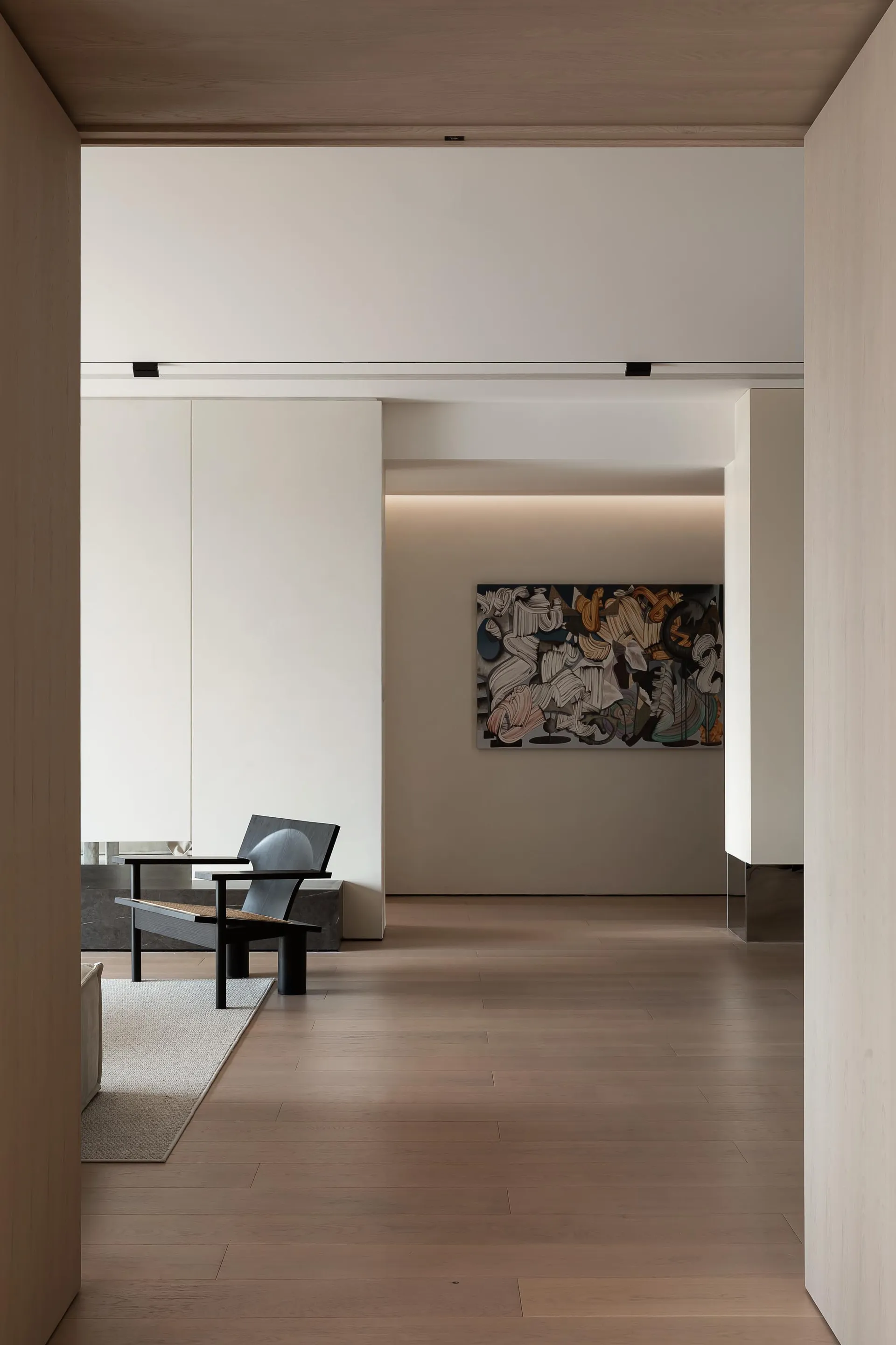 A minimalist desk in a modern interior design setting.