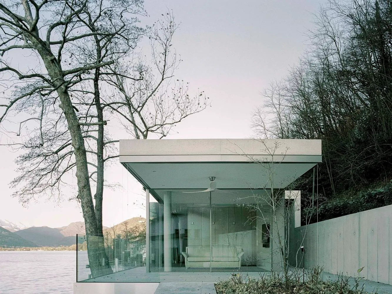 A minimalist residential retreat featuring glass and wood elements.