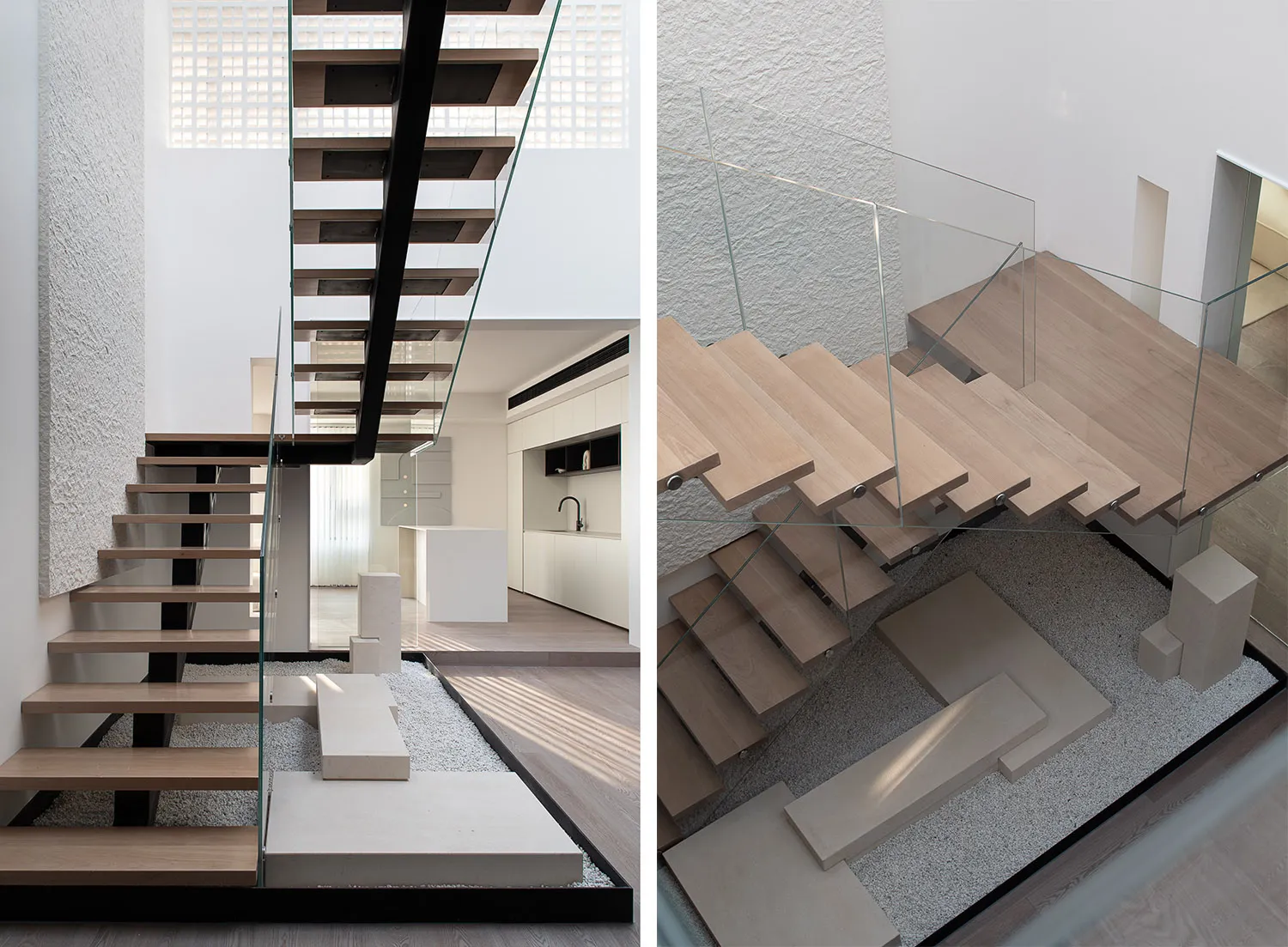 Modern minimalist staircase with metal railings and wooden steps.