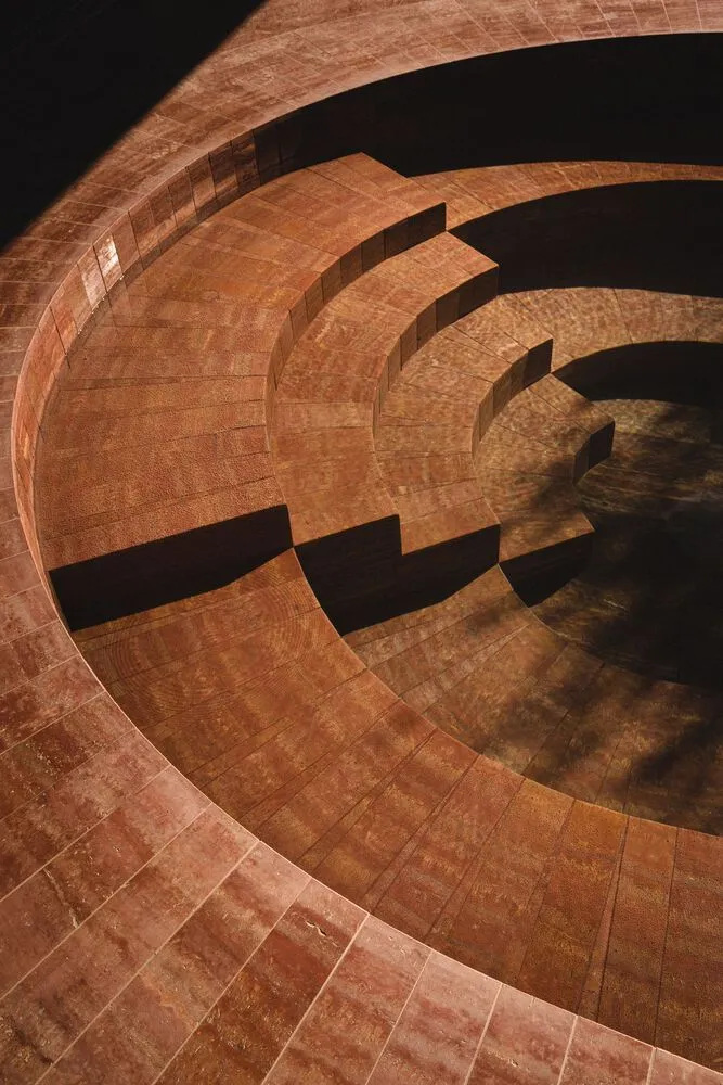A circular seating arrangement made of brick.