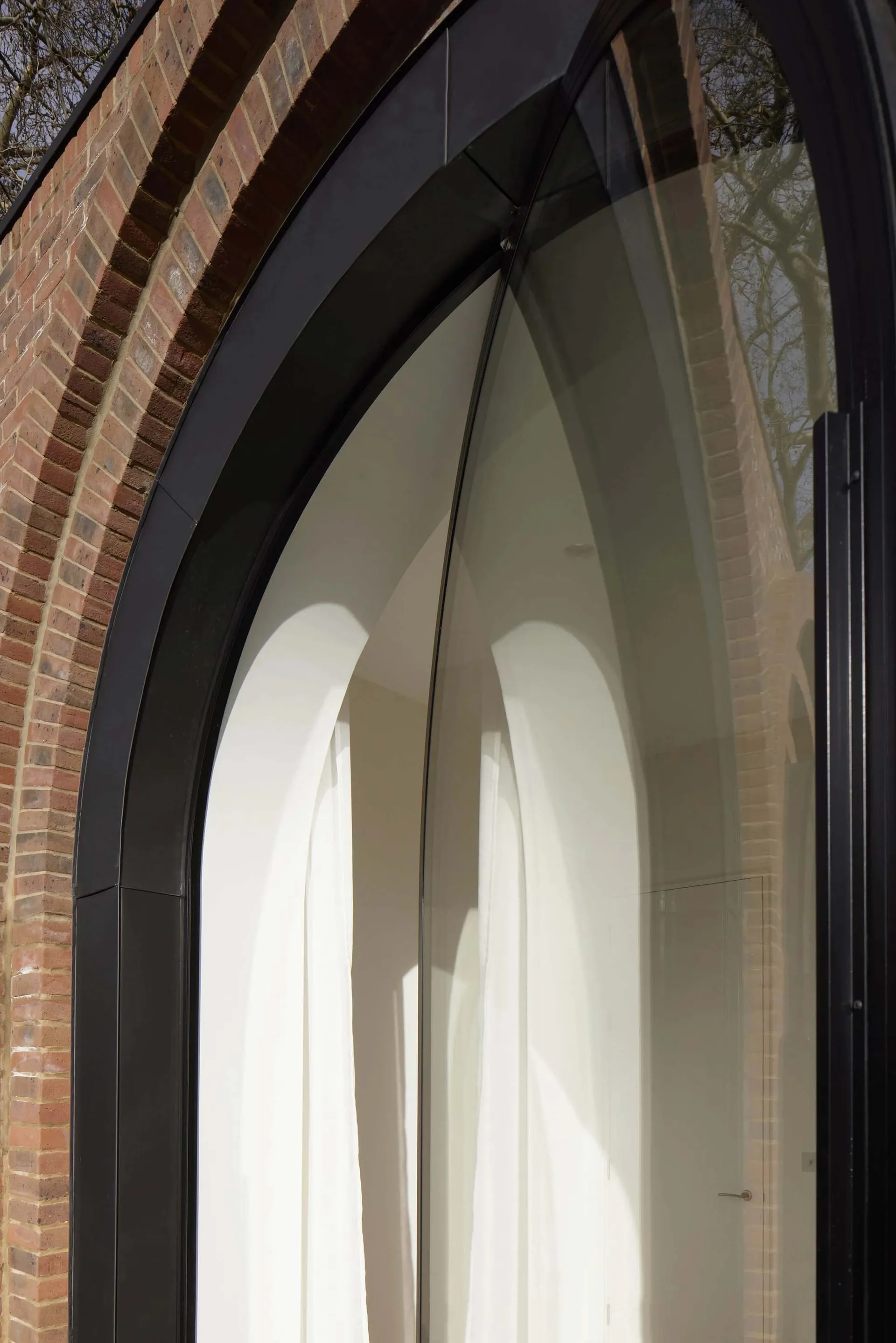 A modern window with a massive glass panel.
