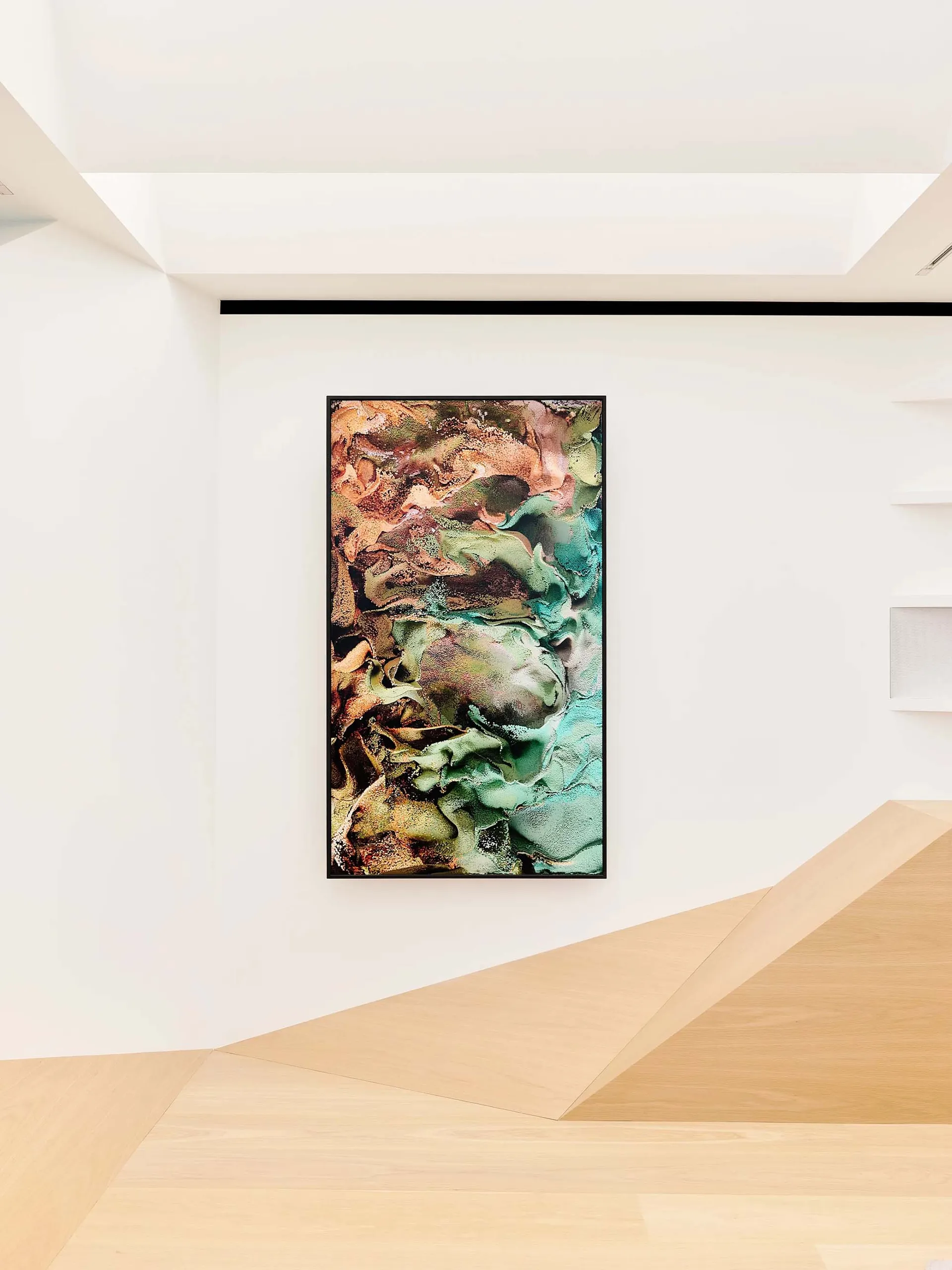 A modern interior featuring an abstract painting with green, brown, and brown hues.