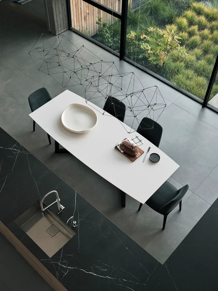 Modern kitchen with concrete countertop and wooden accents