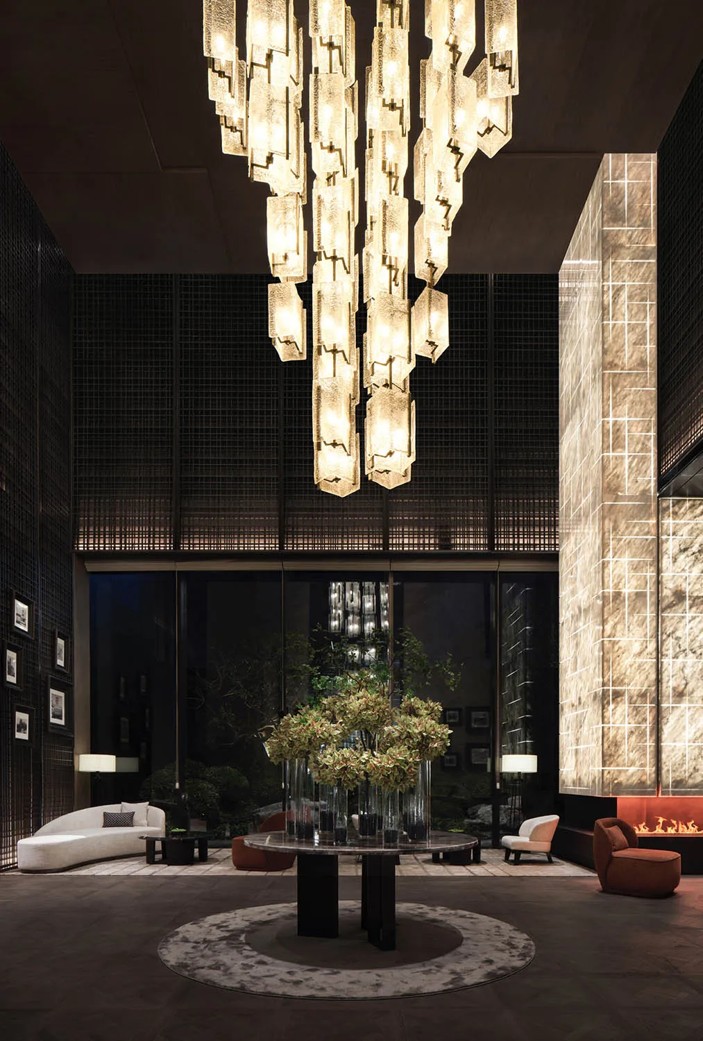Modern lobby featuring elegant metal and glass elements.