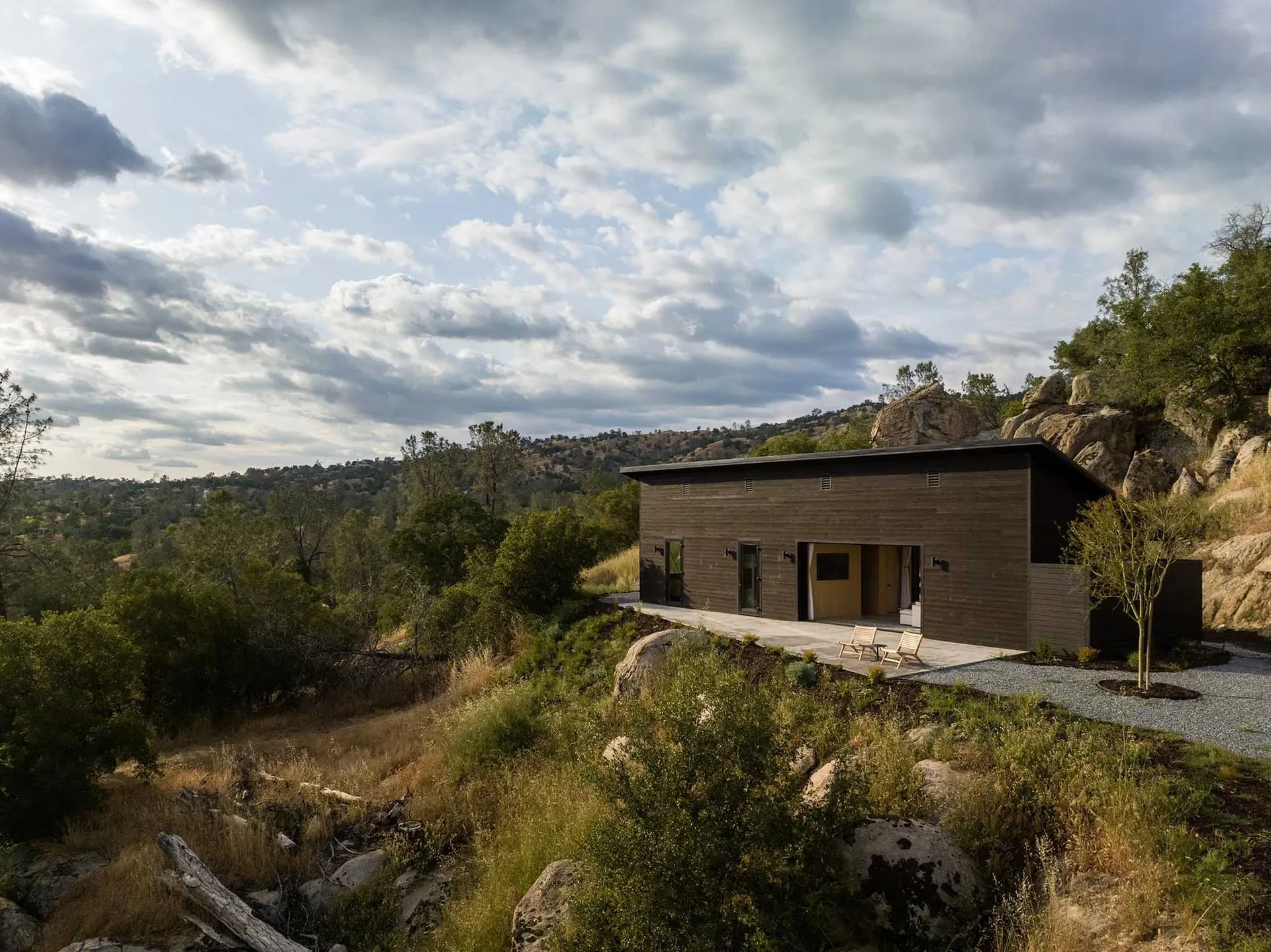 Modern residential home with wooden exterior.