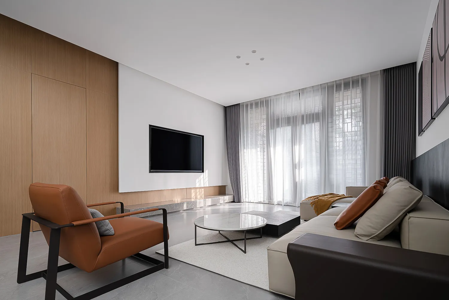 Modern living room with contemporary furniture, minimalist decor, and a sleek, contemporary style.