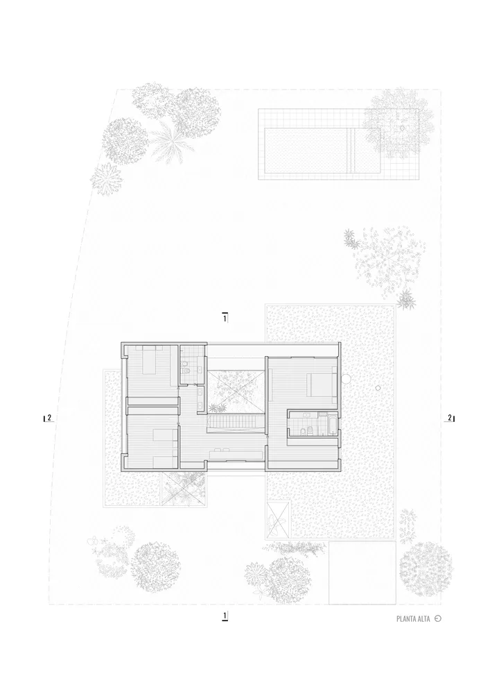 A black and white architectural floor plan of a residential house, showing the layout of rooms and outdoor spaces.