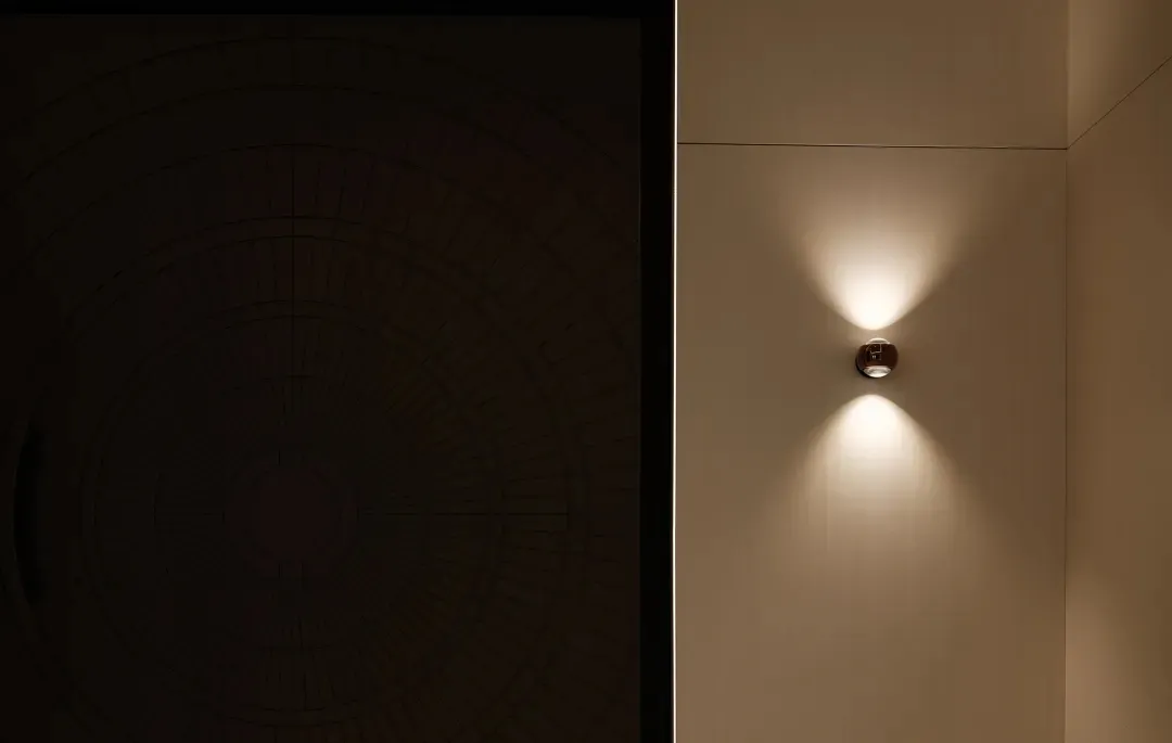 A modern example of steel lighting fixtures mounted on a wall.