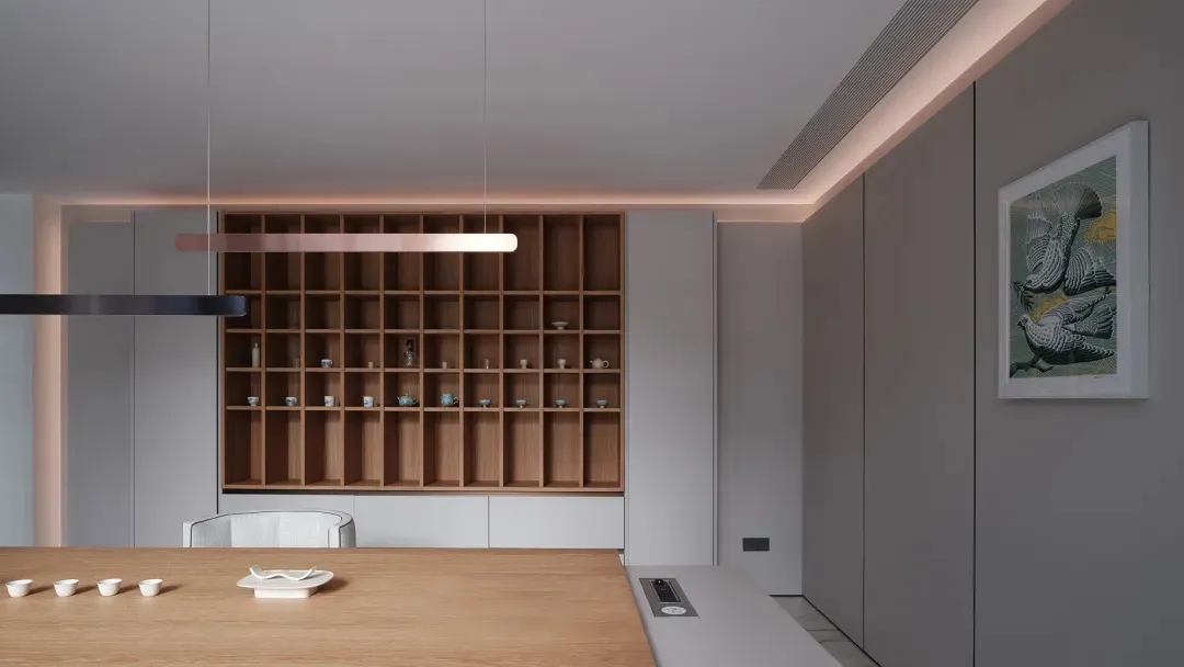 A modern, minimalist kitchen with wood finishes and clean lines.