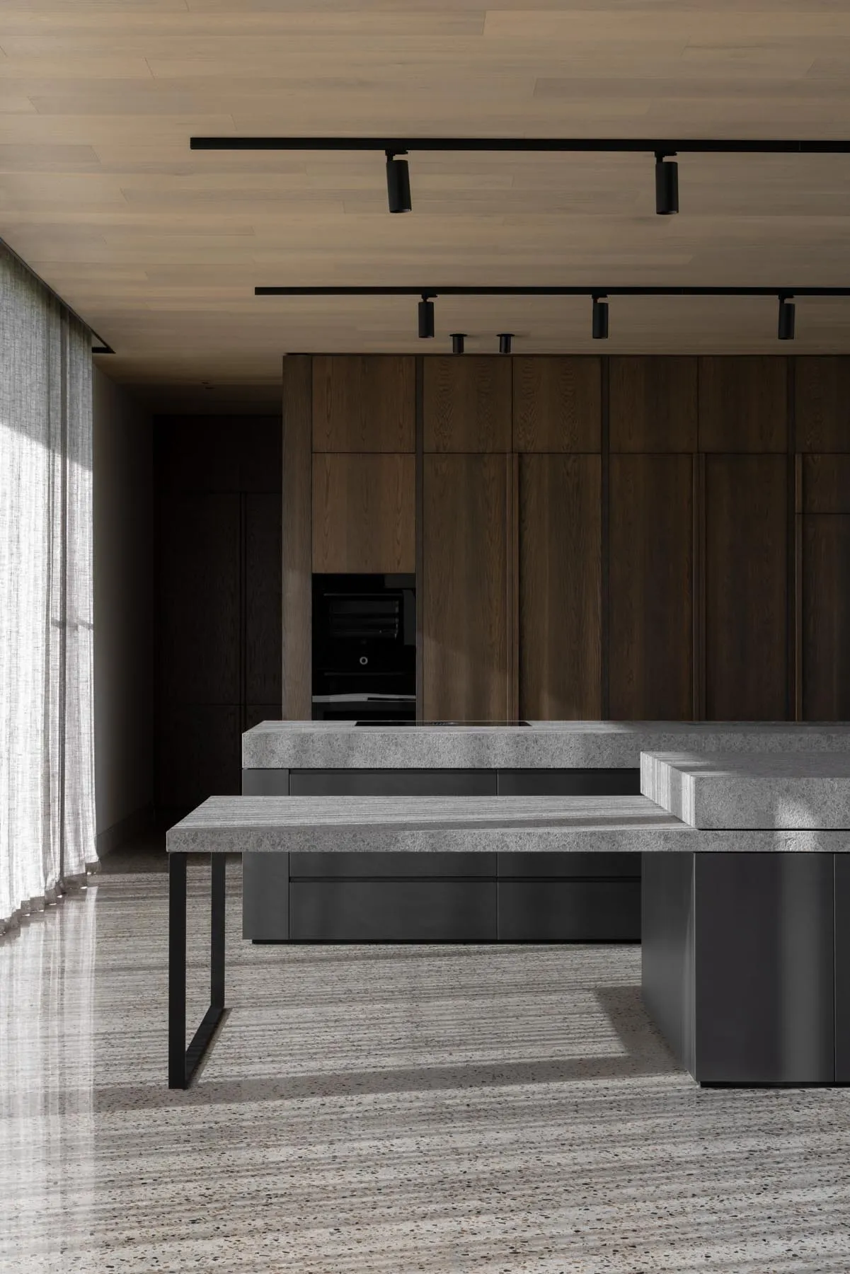 A contemporary residential kitchen featuring a granite countertop.