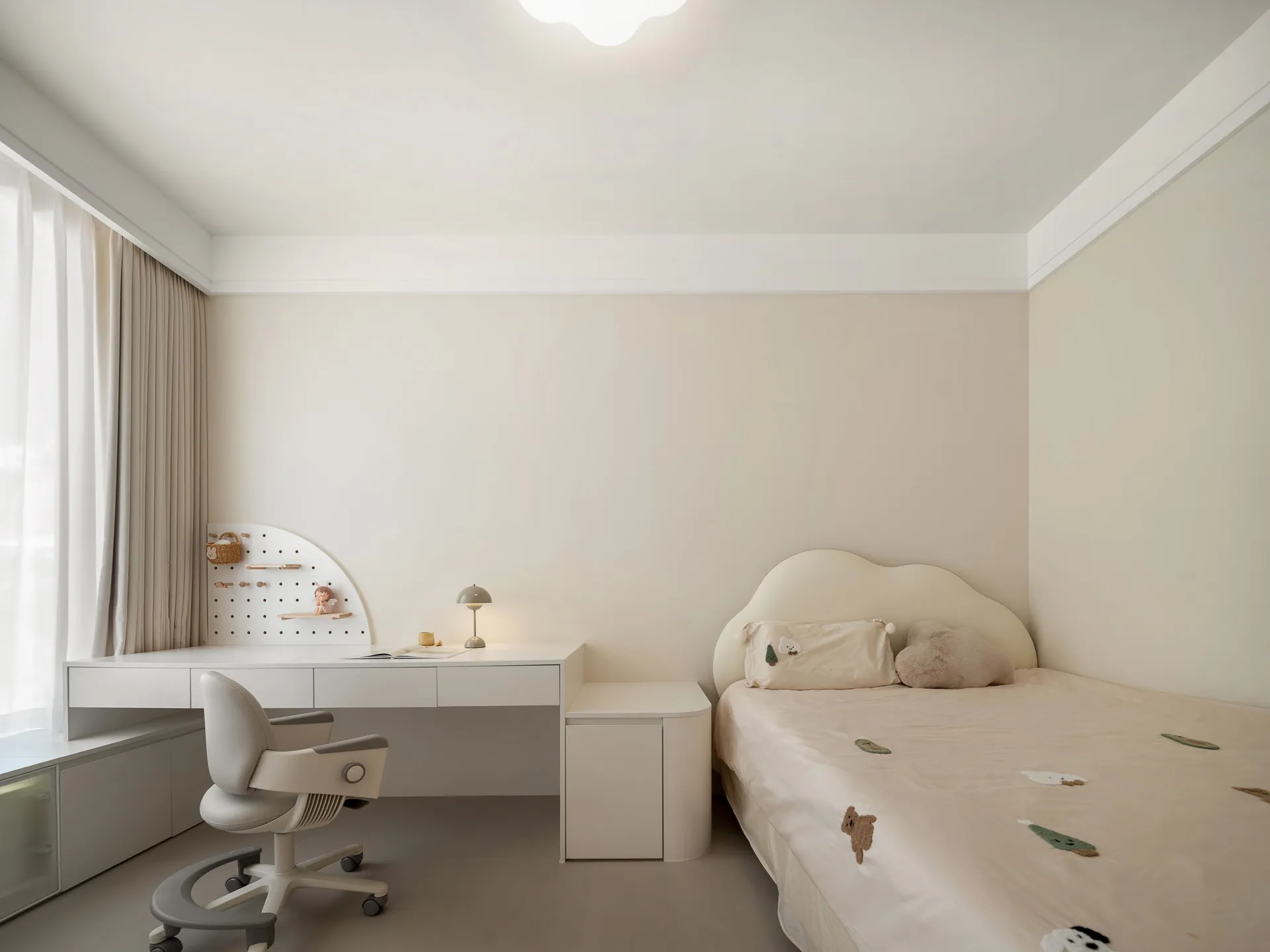 A minimalist bedroom featuring neutral colors and a child's bed with soft textures.