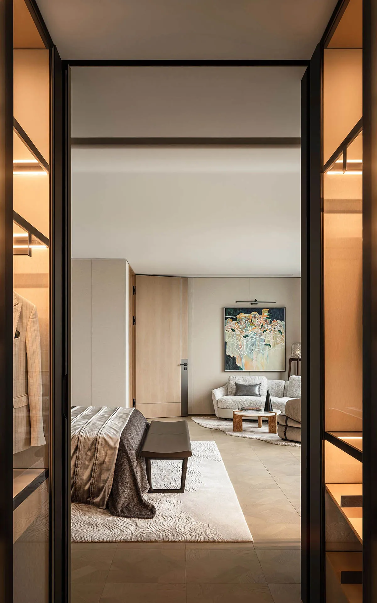 Interior design photo of a modern bedroom featuring wooden furniture and fabric-covered seating.