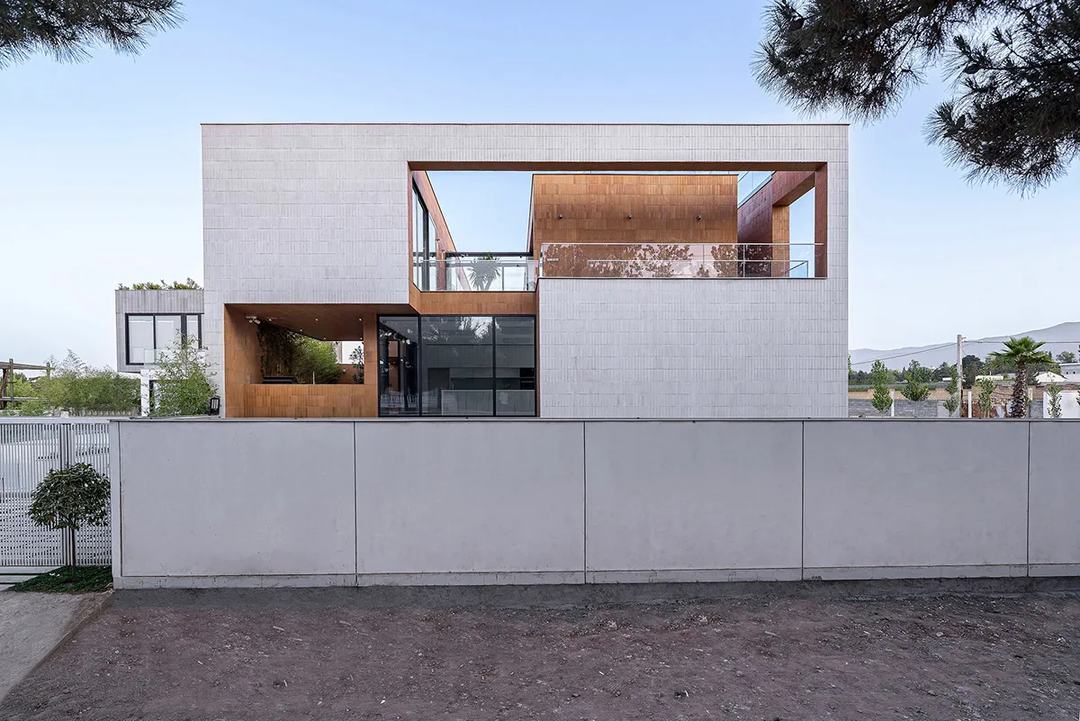 Modern house exterior with concrete walls and wooden accents