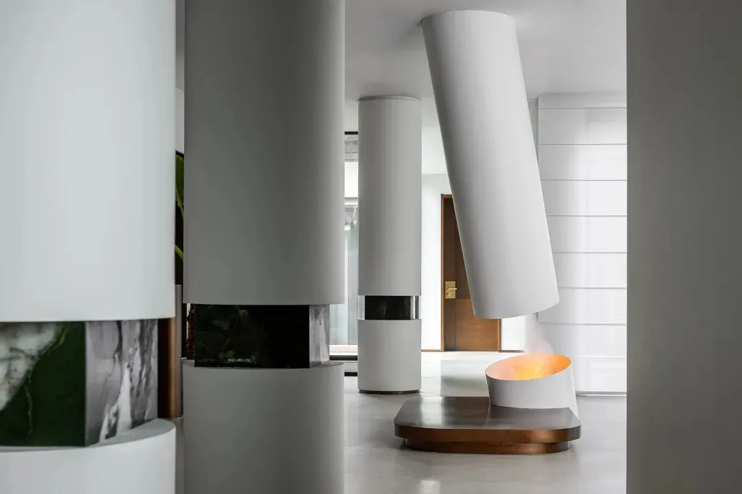 Modern interior design featuring minimalist white concrete elements.