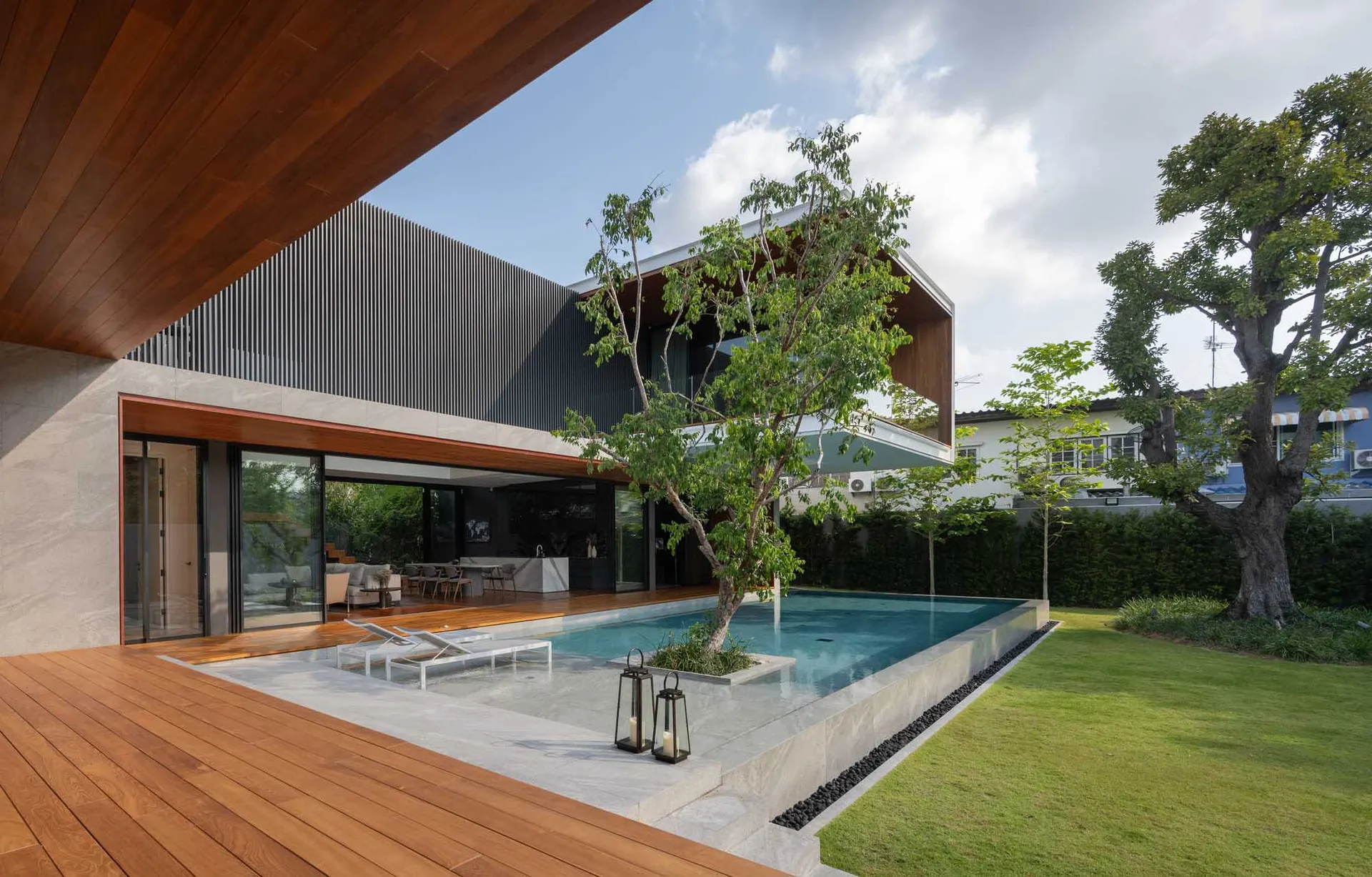 Modern house with concrete, glass, and wooden elements