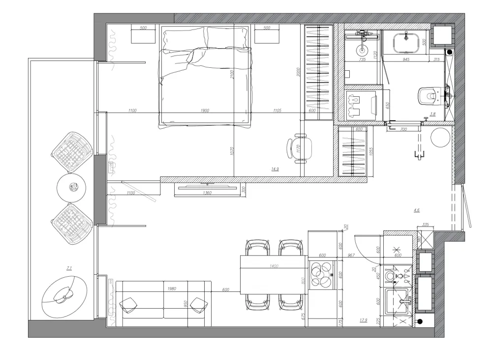 Floor plan of a modern apartment layout with bedroom, kitchen, and living room.