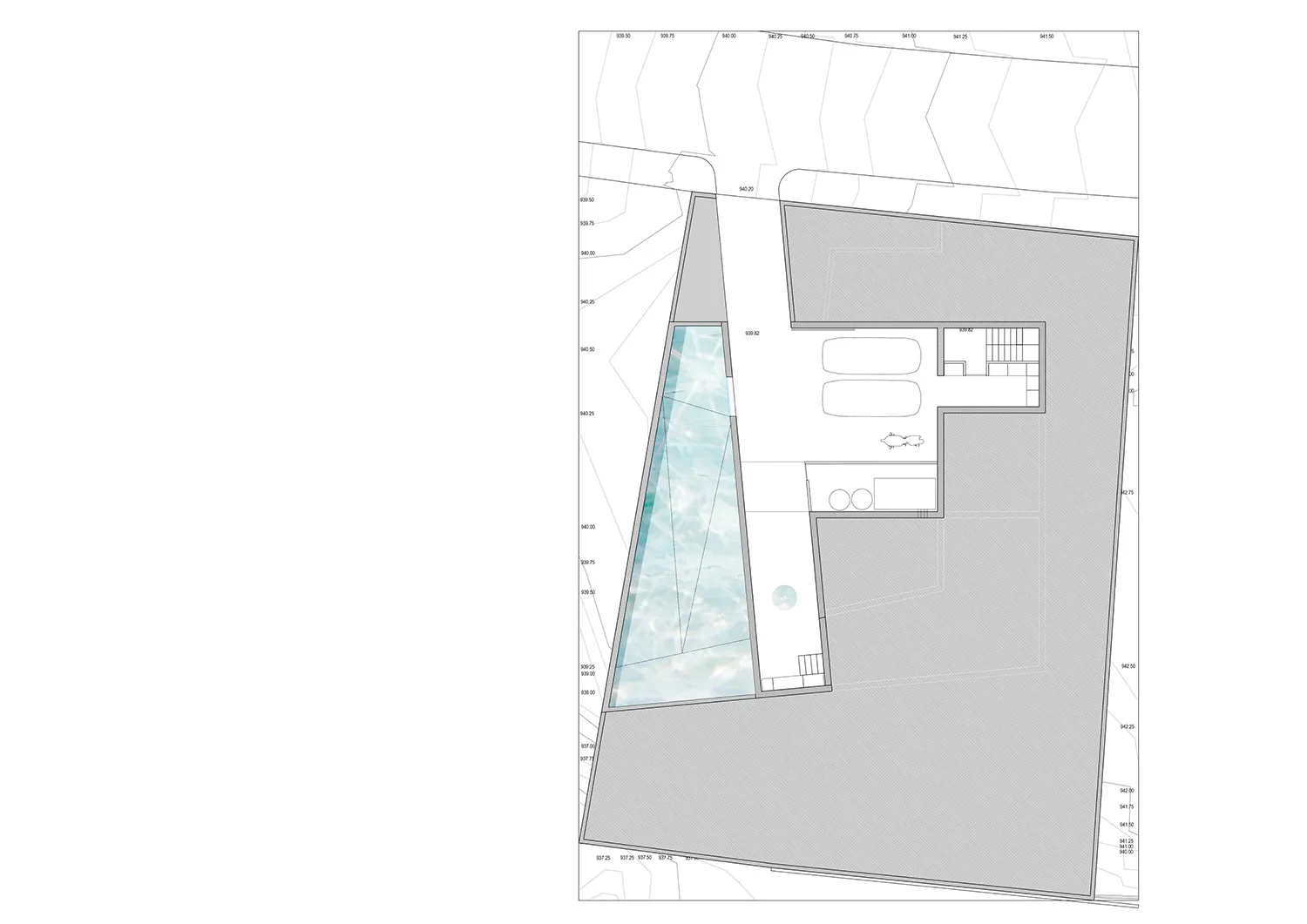 An overhead view of a modern residential floor plan featuring a glass wall.