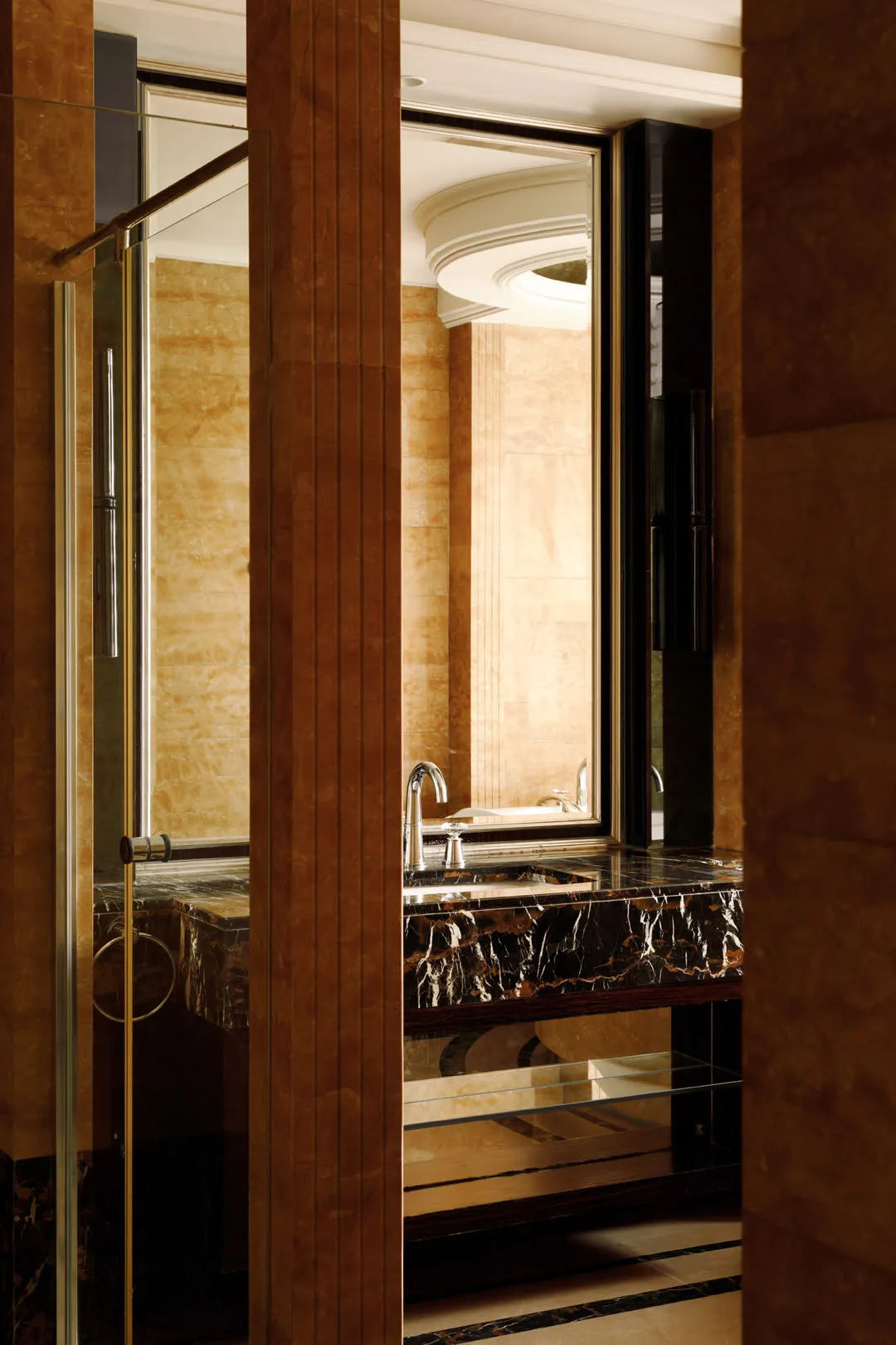 Modern bathroom with marble features, showcasing contemporary design elements.