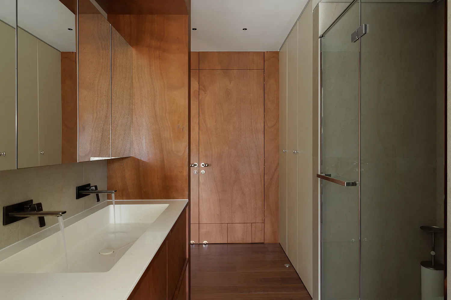 Modern bathroom featuring wooden elements