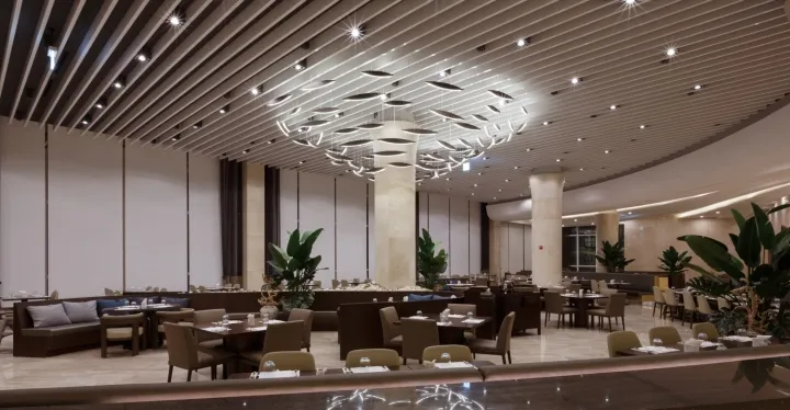 Modern, minimalist restaurant interior with contemporary design elements, featuring clean lines, high ceilings, and sleek fur