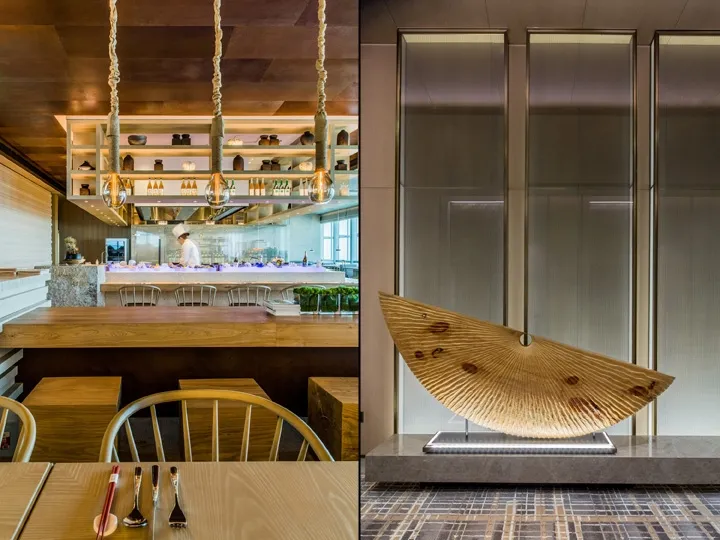 Modern restaurant interior design featuring wooden kitchen and bar counter.