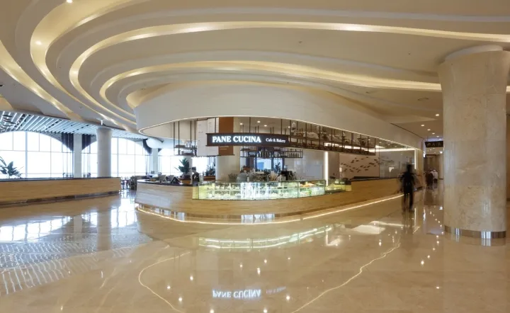 A sleek, modern retail space featuring a stylish marble counter.