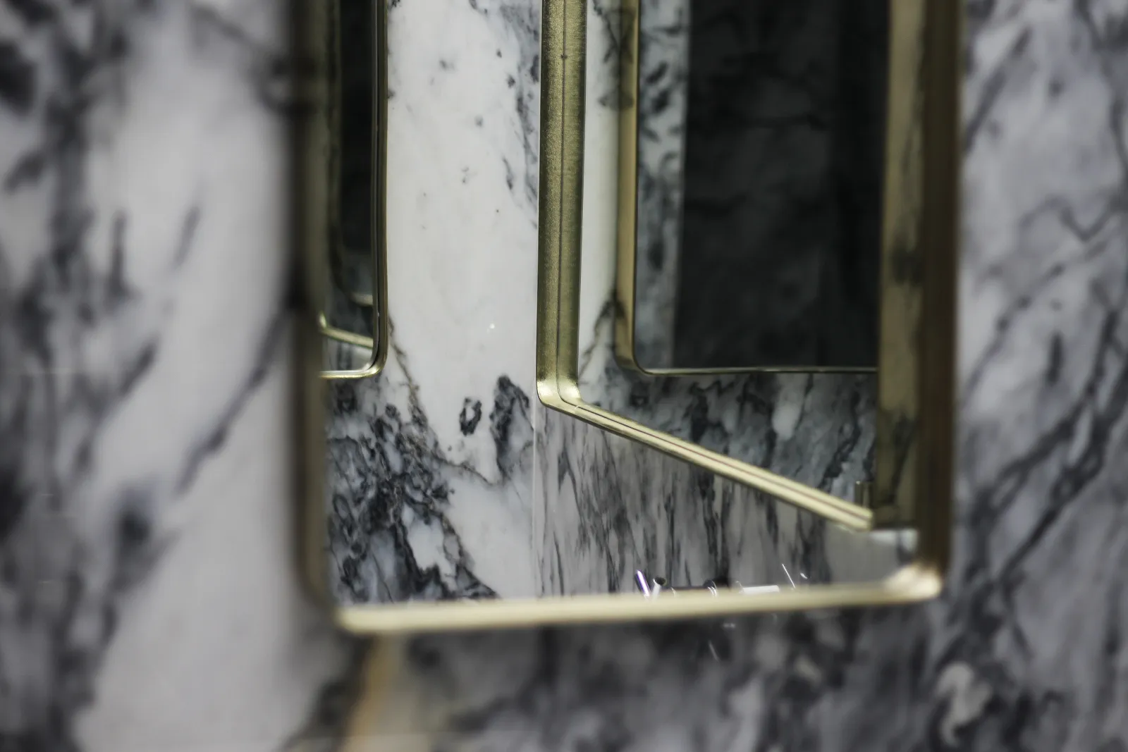 A modern marble bathroom with a sleek, polished finish.
