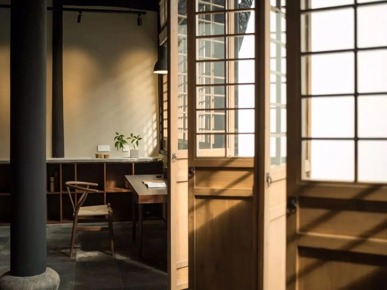 Minimalist office space featuring wooden elements