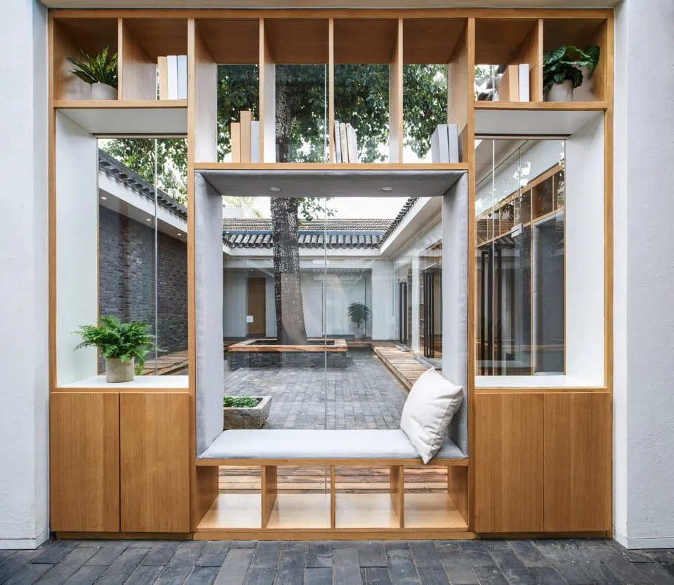 Modern interior design featuring wooden frames and glass elements