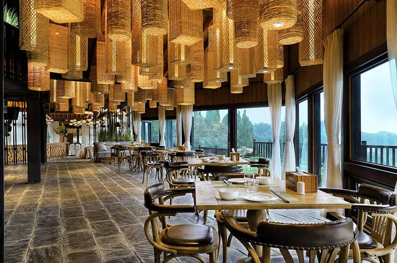 Modern restaurant interior with bamboo lighting fixtures