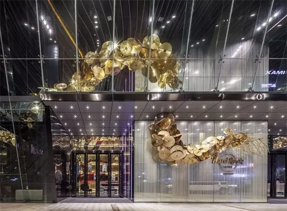 A modern entrance featuring metallic discs