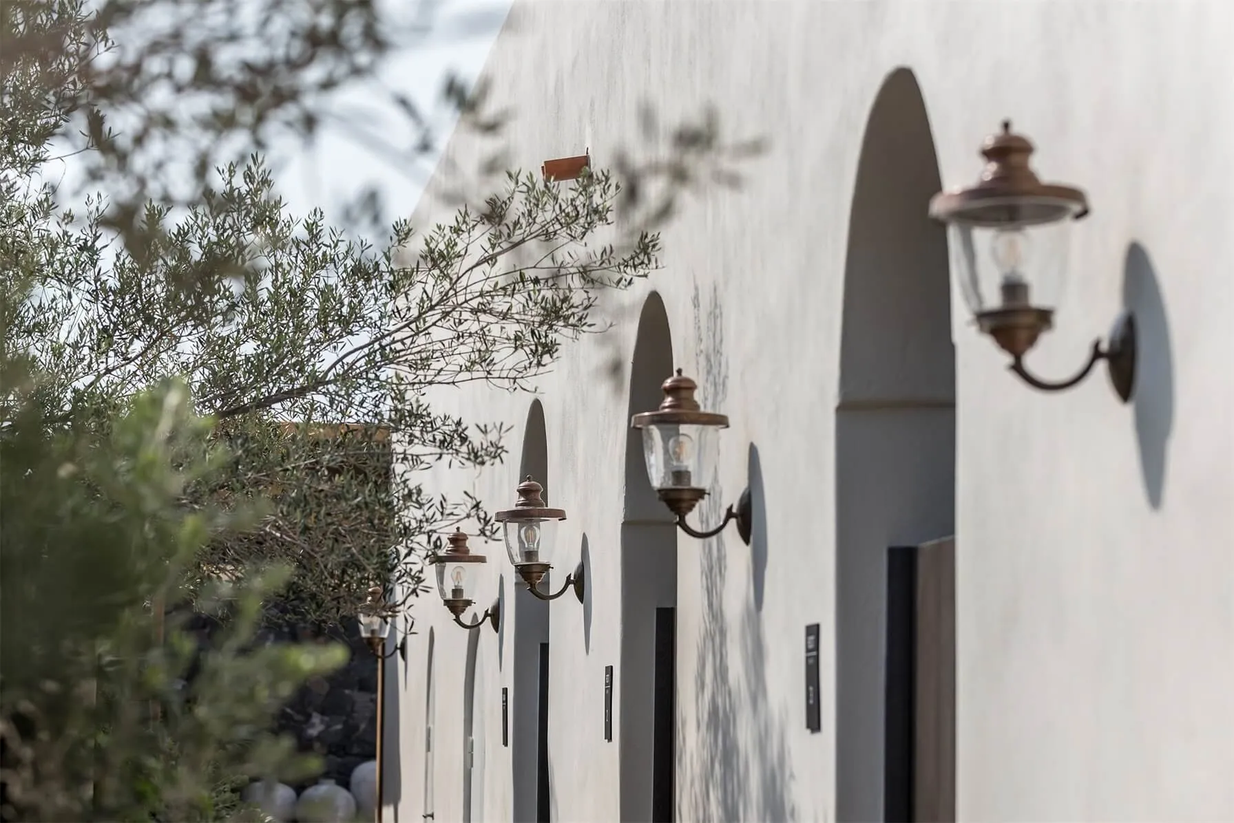 Concrete columns on a white exterior building