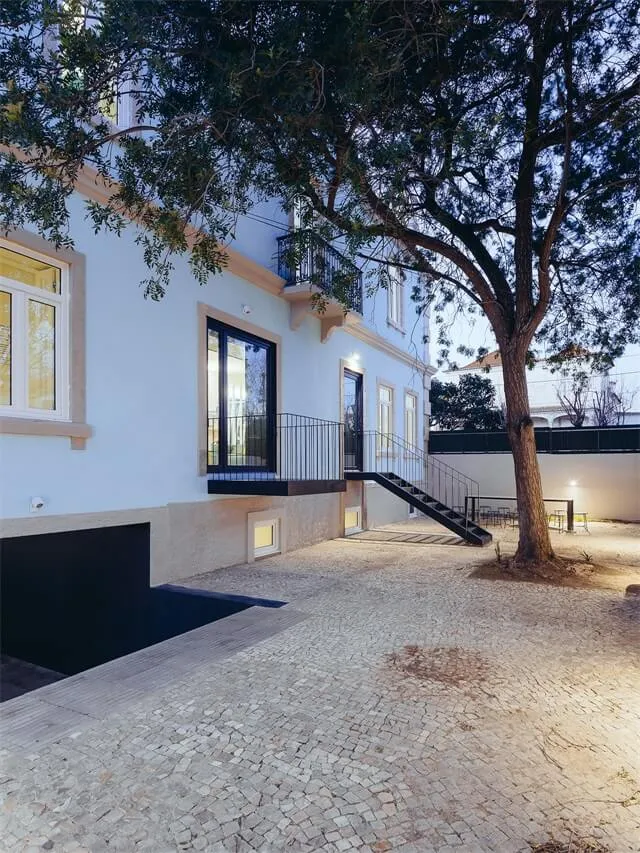 Modern architecture featuring tiled floor and stone accents.