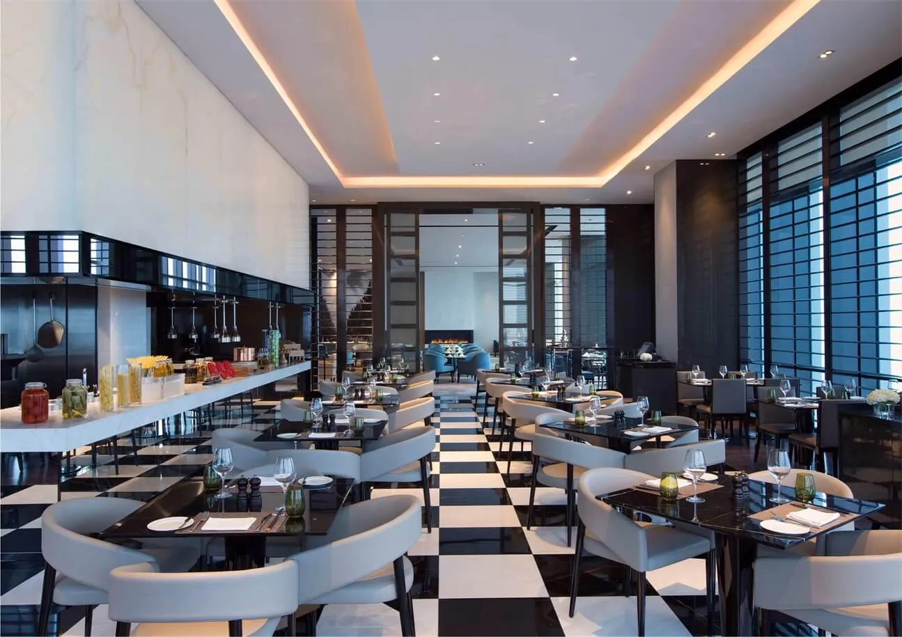 Modern restaurant interior with glass and marble materials