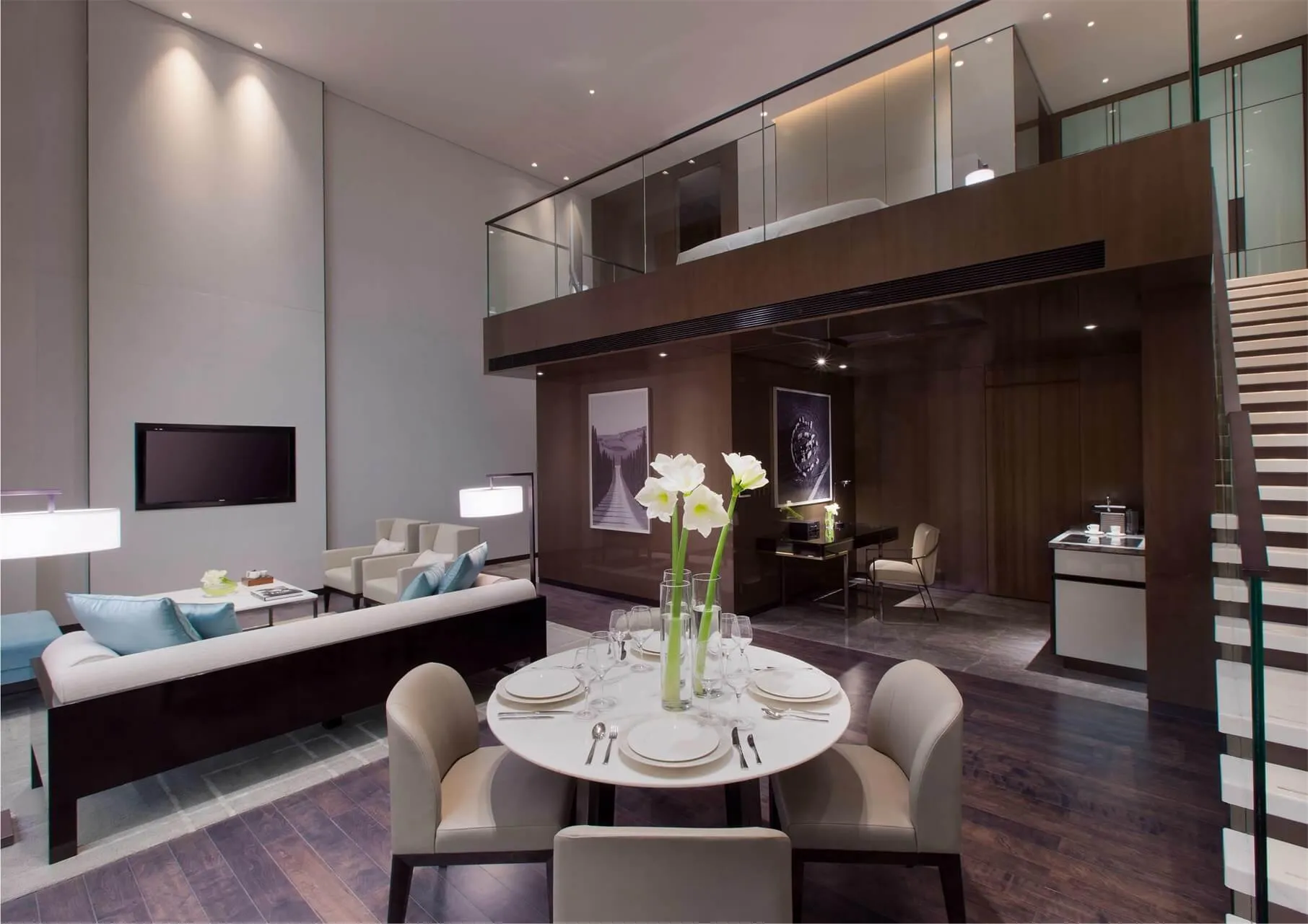 Modern residential living space featuring concrete and glass materials.