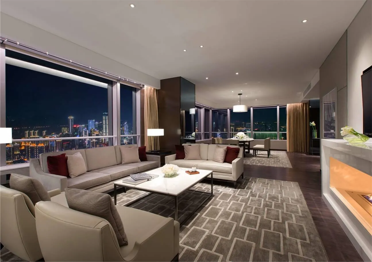 Modern living room with fabric, concrete, and glass materials