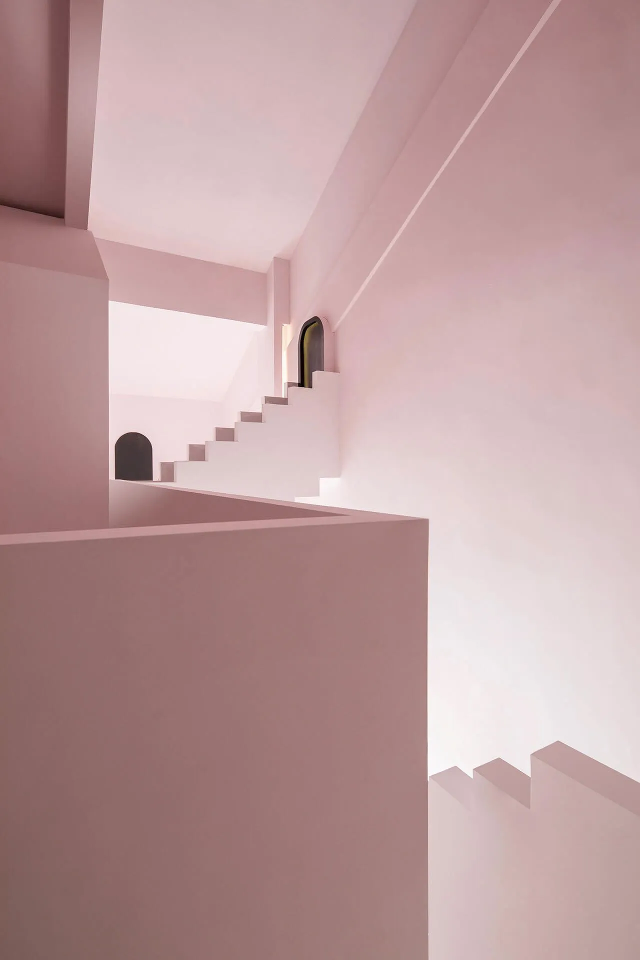 Minimalist architectural space featuring a pink staircase rendered in detail.
