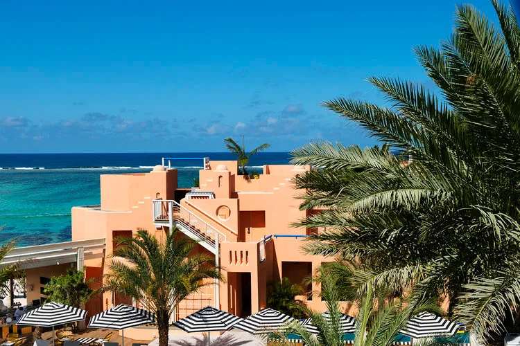 A resort constructed with cement, glass, and metal materials