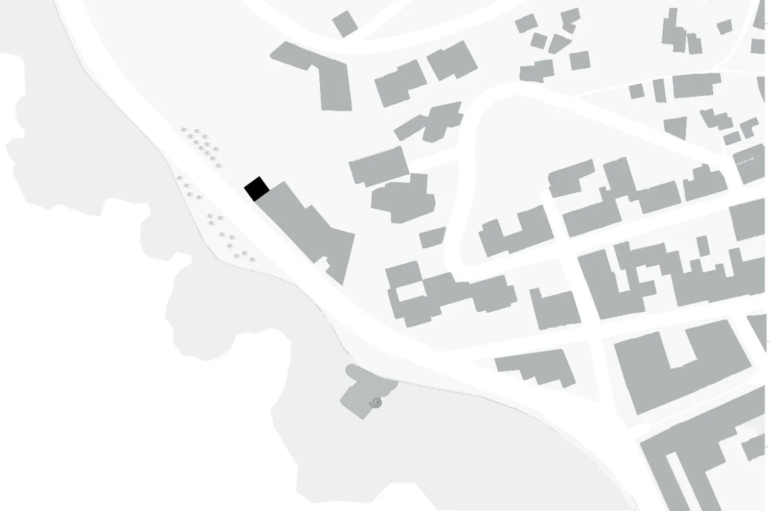 A grayscale city block plan showcasing a black building among other grey structures