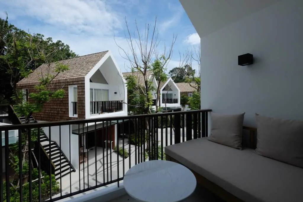 A modern residential construction with wooden exterior.